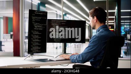 Web Developer Looking At Code. Computer Database Software Programming Stock Photo