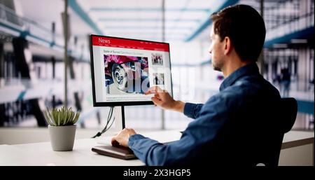 Man Reading News Website On Computer Screen Stock Photo