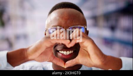 Man Making Heart Sign. Senior Hands Romantic Love Stock Photo