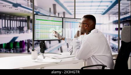Sad Man Doctor Stress And Pain At Computer Stock Photo