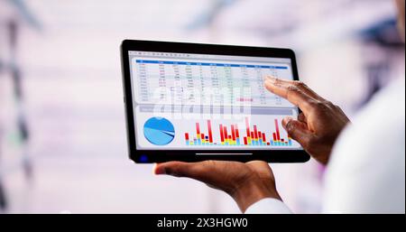 Finance Analytics Data Chart On Tablet Computer Stock Photo