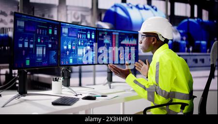 Engineer Operators Using Scada System At Industrial Plant Stock Photo