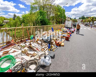 Bric-a-brac laid out in street for local brocante : car boot sale - Preuilly-sur-Claise, Indre-et-Loire (37), France. Stock Photo