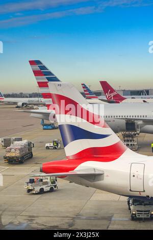 London, England, UK - 29 November 2023: Tail fin of a British Airways jet at London Heathrow airport. Stock Photo