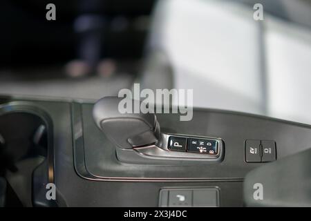 Close-up shot showcasing the modern automatic gearbox and intuitive control buttons. Experience the seamless blend of innovation and convenience in th Stock Photo