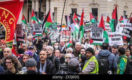London, UK. 27th Apr, 2024. Participants in the 'National March For Palestine And Call For A Permanent Ceasefire protest march from Parliament Square through central London to Hyde Park, whilst protesters from the 'Counter the Hate' counter rally on a corner of Pall Mall. Both sides are separated by barriers and a police presence. Credit: Imageplotter/Alamy Live News Stock Photo