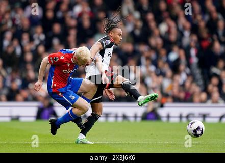 Crystal Palace's Will Hughes (left) and Fulham's Bobby De Cordova-Reid battle for the ball during the Premier League match at Craven Cottage, London. Picture date: Saturday April 27, 2024. Stock Photo