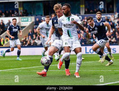 Bali Mumba of Plymouth Argyle shields the ball during the Sky Bet Championship match Millwall vs Plymouth Argyle at The Den, London, United Kingdom, 27th April 2024 (Photo by Stan Kasala/News Images) in, on 4/27/2024. (Photo by Stan Kasala/News Images/Sipa USA) Credit: Sipa USA/Alamy Live News Stock Photo