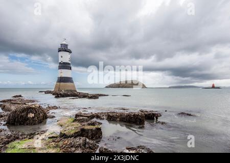 Trwyn Du Lighthouse, also known as Penmon Lighthouse, Anglesey, Wales, UK Stock Photo