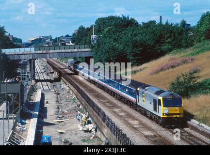 A Class 60 diesel locomotive number 60047 top and tail with a Class 59 diesel locomotive number 59005 working an enthusiast railtour at North Acton on the 18th August 1991. Stock Photo