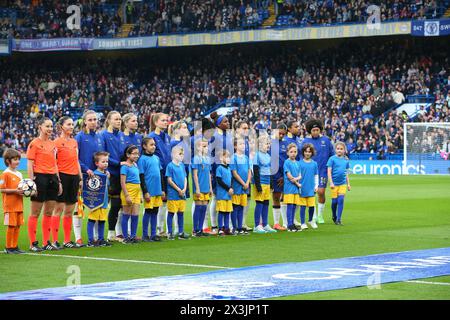 27th April 2024; Stamford Bridge, London, England: UEFA Womens Champions League Football, Semi Final, Second Leg, Chelsea  versus Barcelona; Chelsea starting line up with their players mascots. Stock Photo