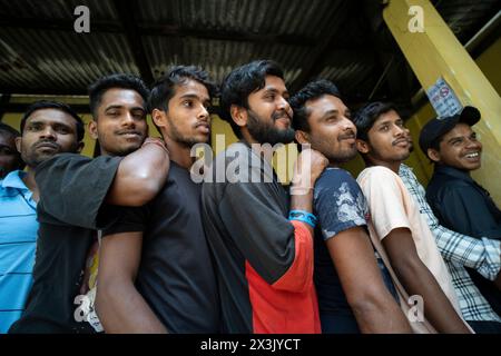 April 26, 2024: People waiting in queue to cast their vote in the second phase of India's general election at a polling station on April 26, 2024 in Morigaon, Assam, India. The Indian General Election, a massive democratic exercise, is held every five years to elect members to the Lok Sabha, which is the lower house of India's Parliament. (Credit Image: © David Talukdar/ZUMA Press Wire) EDITORIAL USAGE ONLY! Not for Commercial USAGE! Stock Photo