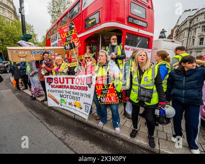 London, UK. 27th Apr, 2024. A stop the ULEZ (ultra low emission zone) against the extended zone across London - attended by inflatable dinosaurs and a cofing for democracy. It is also anti Sadiq Khan (Mayor of London) protest in Trafalgar Square. Credit: Guy Bell/Alamy Live News Stock Photo