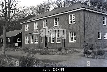 1960s, historical view of the Q.A.R.A.N.C (Queen Alexandra's Royal Army Nursing Corps,) Officers Mess, Bovington camp, Dorset, England, UK. The service was formed in 1854 to provide the nursing and medical needs of the British army and their allies. Known originally as the Army Nursing Service, before becoming the Queen Alexandra's Imperial Miltary Nursing Service. In 1949, the service was renamed as the Queen Alexandra's Royal Army Nursing Corps (QARANC). Stock Photo