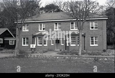 1960s, historical view of the Q.A.R.A.N.C (Queen Alexandra's Royal Army Nursing Corps,) Officers Mess, Bovington camp, Dorset, England, UK. The service was formed in 1854 to provide the nursing and medical needs of the British army and their allies. Known originally as the Army Nursing Service, before becoming the Queen Alexandra's Imperial Miltary Nursing Service. In 1949, the service was renamed as the Queen Alexandra's Royal Army Nursing Corps (QARANC). Stock Photo