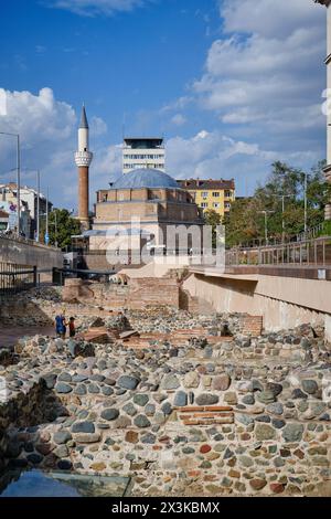 Bulgaria, Sofia, people at the ancient Serdika roman ruins downtown and the Banja Baši Mosque in the background Stock Photo