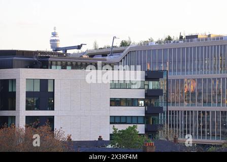 Evening view of Kings Place with the new Google landscraper behind, at Kings Cross, north London, UK Stock Photo