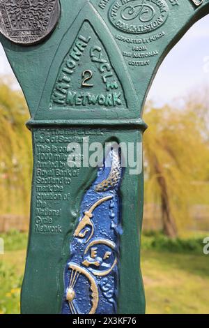 By the Hythe Military Canal one of 1000 mileposts marking the National Cycle Network which were funded by the Royal Bank of Scotland, Kent, UK Stock Photo