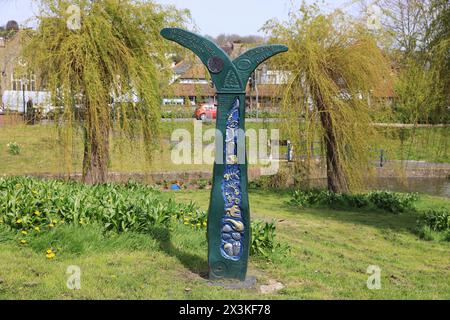 By the Hythe Military Canal one of 1000 mileposts marking the National Cycle Network which were funded by the Royal Bank of Scotland, Kent, UK Stock Photo