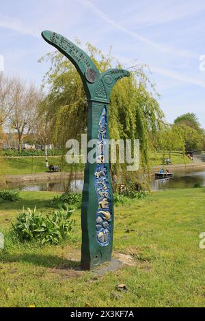 By the Hythe Military Canal one of 1000 mileposts marking the National Cycle Network which were funded by the Royal Bank of Scotland, Kent, UK Stock Photo