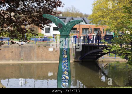 By the Hythe Military Canal one of 1000 mileposts marking the National Cycle Network which were funded by the Royal Bank of Scotland, Kent, UK Stock Photo