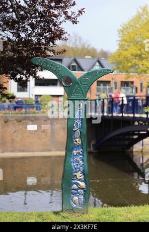 By the Hythe Military Canal one of 1000 mileposts marking the National Cycle Network which were funded by the Royal Bank of Scotland, Kent, UK Stock Photo