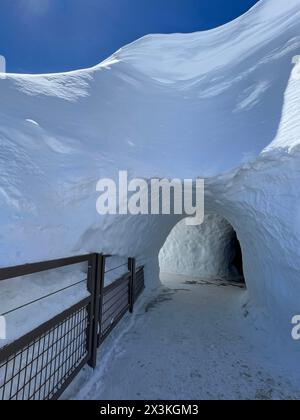 Haute-Savoie, France: ice tunnel on the top of L’Aiguille du Midi, the highest spire (3.842 m) of the Aiguilles de Chamonix in the Mont Blanc massif Stock Photo