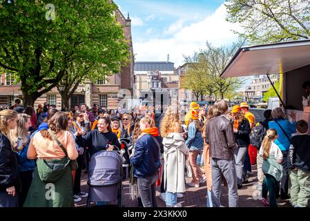 April 27, 2024: Leiden, Netherlands, Canals party celebration the birthday of the King in Netherlands, National holiday King’s Day or Koningsdag in Du Stock Photo