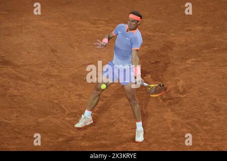 Madrid, Spain. 27th Apr, 2024. Rafael Nadal of Spain against Alex de Minaur in the Men's Singles Round of 64 match during Day Five of the Mutua Madrid Open at La Caja Magica on April 27, 2024 in Madrid, Spain. (Photo by Oscar Gonzalez/Sipa USA) Credit: Sipa USA/Alamy Live News Stock Photo