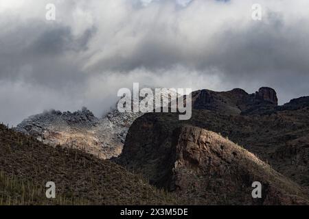 Dusting of snow on desert mountains Stock Photo