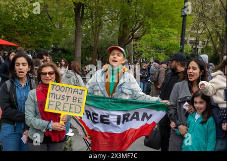 New York, United States. 27th Apr, 2024. NEW YORK, NEW YORK - APRIL 27: Protesters chant during a protest in solidarity with the Iranian rapper Toomaj Salehi who was sentenced to death by courts in Iran for supporting anti-government protest movement in Washington Square Park on April 27, 2024 in New York City. Credit: Ron Adar/Alamy Live News Stock Photo