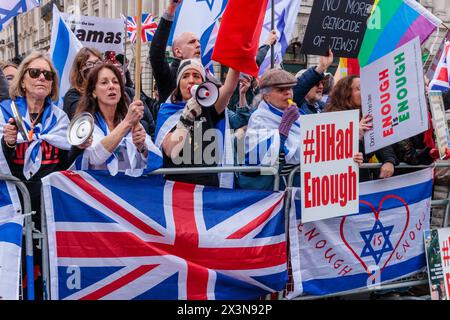 Waterloo Place, London, UK. 27th April 2024. People of all faiths join the 'Enough is Enough' counter protests in a stand against the open support and glorification of proscribed terrorist organisations and a perceived two-tier policing system have further fueled the concerns of British Jews and their allies. The counter protests were organised in response to almost 7 months of Pro-Palestinian marches. Previous counter protests have seen the group face death threats and calls for the genocide of Jews from the Nation of Israel. Photo by Amanda Rose/Alamy Live News Stock Photo