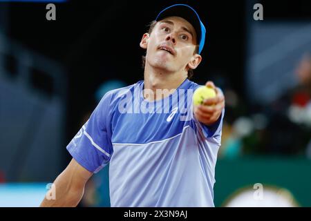 Alex de Minaur of Australia in action against Rafael Nadal of Spain during the Mutua Madrid Open 2024, ATP Masters 1000 and WTA 1000, tennis tournament on April 27, 2024 at Caja Magica in Madrid, Spain Stock Photo