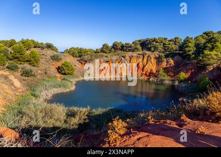 Bauxite quarry pond in Otranto, province of Lecce, Puglia, Italy Stock Photo