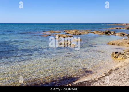 Beautiful clear waters of Salve beach called also ' The Seycelles of Salento' in Salento region, province of Lecce, Italy Stock Photo