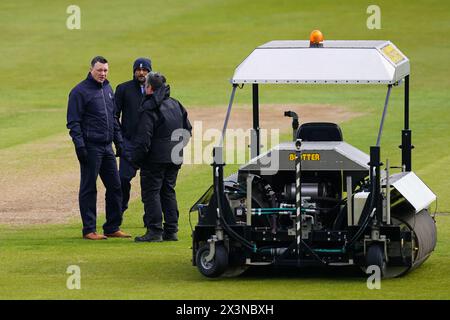 Bristol, UK, 28 April 2024. Umpires Neil Pratt and Surendiran Shanmugam inspect the pitch during the Vitality County Championship Division Two match between Gloucestershire and Middlesex. Credit: Robbie Stephenson/Gloucestershire Cricket/Alamy Live News Stock Photo