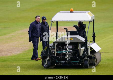 Bristol, UK, 28 April 2024. Umpires Neil Pratt and Surendiran Shanmugam inspect the pitch during the Vitality County Championship Division Two match between Gloucestershire and Middlesex. Credit: Robbie Stephenson/Gloucestershire Cricket/Alamy Live News Stock Photo