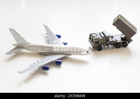 Top view on plastic model military vehicle and aircraft Stock Photo