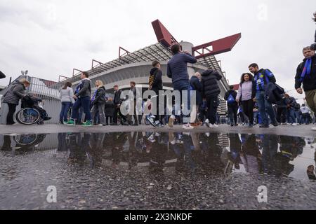 Milan, Italy. 28th Apr, 2024. Fans arrive for the Serie A match at Giuseppe Meazza, Milan. Picture credit should read: Jonathan Moscrop/Sportimage Credit: Sportimage Ltd/Alamy Live News Stock Photo