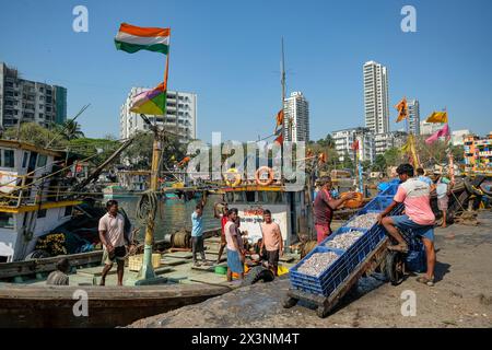 Mumbai, India - March 8, 2024: Fishermen at the Sassoon Dock in the Colaba district of Mumbai, India. Stock Photo