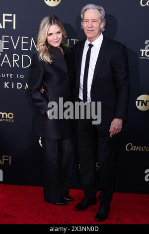 HOLLYWOOD, LOS ANGELES, CALIFORNIA, USA - APRIL 27: Michelle Pfeiffer and husband David E. Kelley arrive at the 49th Annual AFI (American Film Institute) Lifetime Achievement Award Gala Tribute Celebrating Nicole Kidman held at the Dolby Theatre on April 27, 2024 in Hollywood, Los Angeles, California, United States. (Photo by Xavier Collin/Image Press Agency) Stock Photo