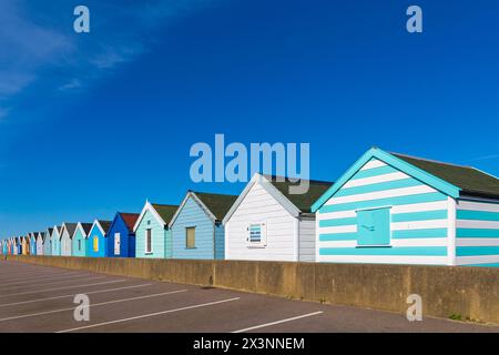 Row of colourful beach huts at Southwold, Suffolk, UK in April Stock Photo
