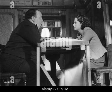 Film Director ALFRED HITCHCOCK and MARGARET LOCKWOOD on the set at Islington Studios during the filming of THE LADY VANISHES 1938 Story ETHEL LINA WHITE Screenplay FRANK LAUNDER and SIDNEY GILLIAT  Gainsborough Studios / Metro Goldwyn Mayer Stock Photo