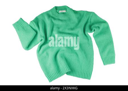 Green flying crumpled women's autumn knitted sweater isolated on white background. Creative clothing concept, trendy fall winter cozy creasy jersey pu Stock Photo
