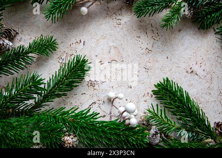 Christmas tree spruce for frame with decor on the wood background. Copy space. Top view. Stock Photo