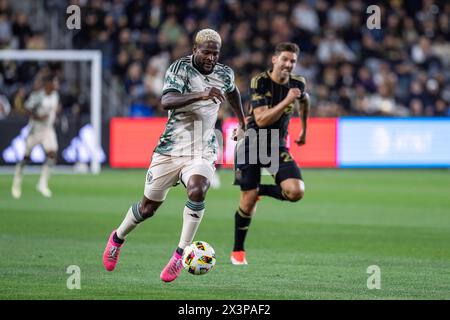 Portland Timbers forward Dairon Asprilla (27) is chased by LAFC midfielder Ryan Hollingshead (24) during a MLS match, Saturday, April 27, 2024, at the Stock Photo