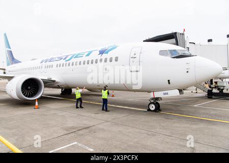 Simply the West(Jet)  Inaugural Edinburgh flight for Canadian airline WestJet  Canadian airline WestJet’s inaugural flight from Edinburgh has departed Stock Photo