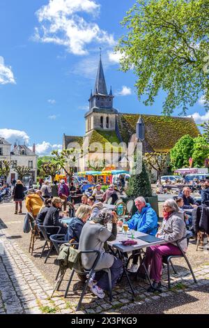 Busy lunchtime for diners and visitors in market place of Le Grand-Pressigny, Indre-et-Loire (37), France. Stock Photo