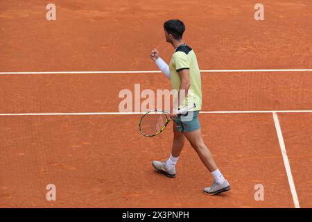 Carlos Alcaraz of Spain  against Thiago Seyboth  in the Men's Singles Round of 32 Match during Day Six of the Mutua Madrid Open at La Caja Magica on A Stock Photo