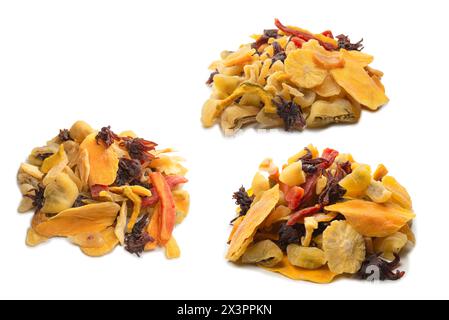 Mix of dried exotic fruit, mangos,slices of pineapples, passion fruit, papaya. Vegetarian dessert. Stock Photo